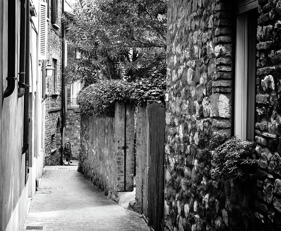 Quiet street in Sirmione, Italy #1 Photograph by Alexey Stiop