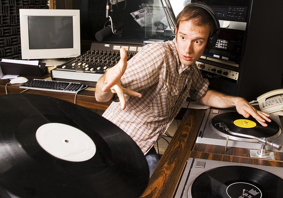 Radio DJ - Throwing Records #1 Photograph by Renphoto