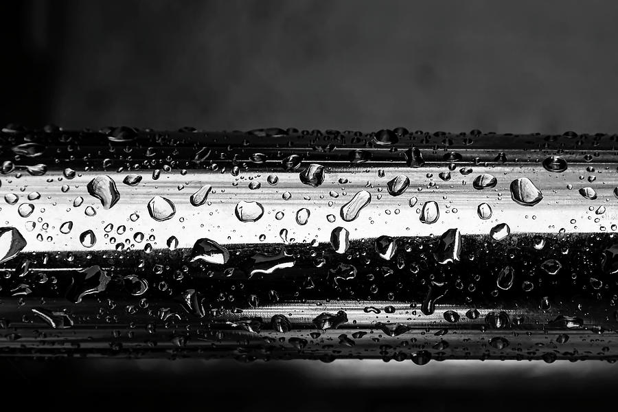 Raindrops On Metal Photograph