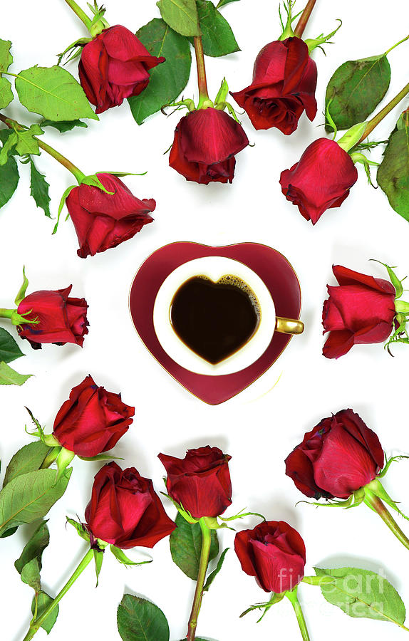 Red roses creative flat lay layout with coffee in heart shaped cup and saucer. #1 Photograph by Milleflore Images