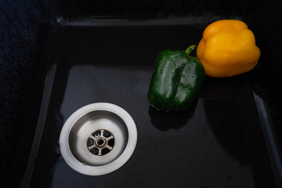 Rinsing Peppers In Sink #1 Photograph by Faba-Photograhpy