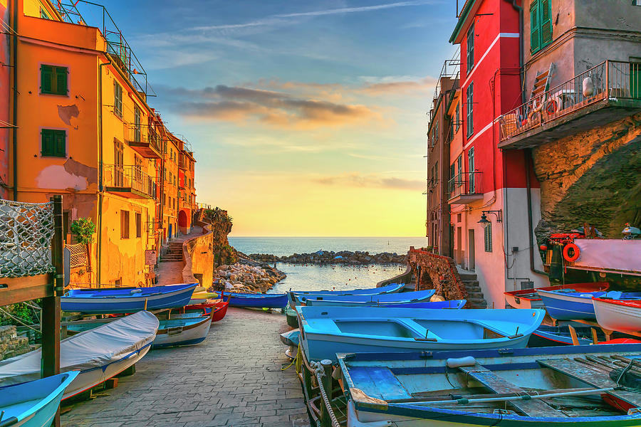 Riomaggiore village street, boats and sea. Cinque Terre, Ligury, #1 Photograph by Stefano Orazzini