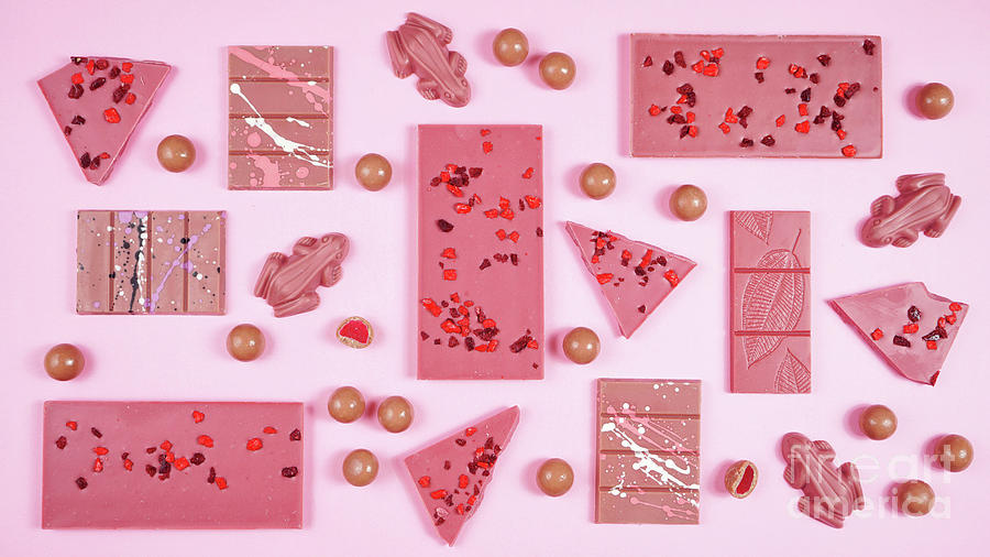 Candy Photograph - Ruby chocolate selection flat lay overhead on pink background. #1 by Milleflore Images