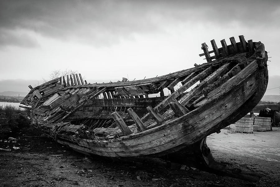 Ruins Of An Old Wooden Ship In Black And White Photograph