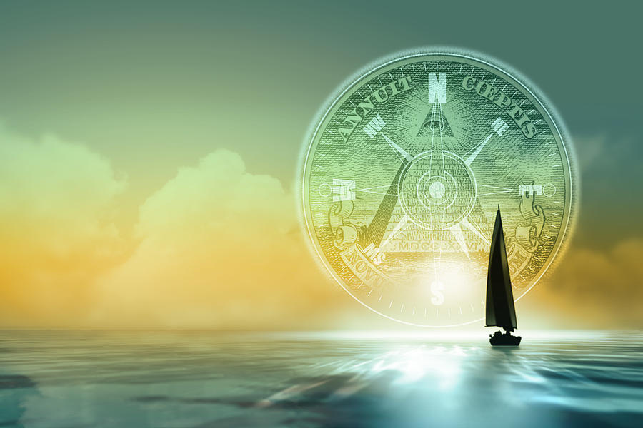 Sailboat on water with compass #1 Photograph by Comstock Images