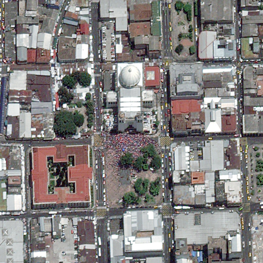 Satellite Image of August festivities in San Salvador #1 Photograph by DigitalGlobe