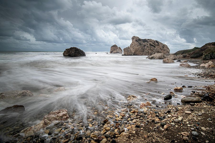 Seascape with windy waves during stormy weather on a rocky coast Photograph by Michalakis Ppalis