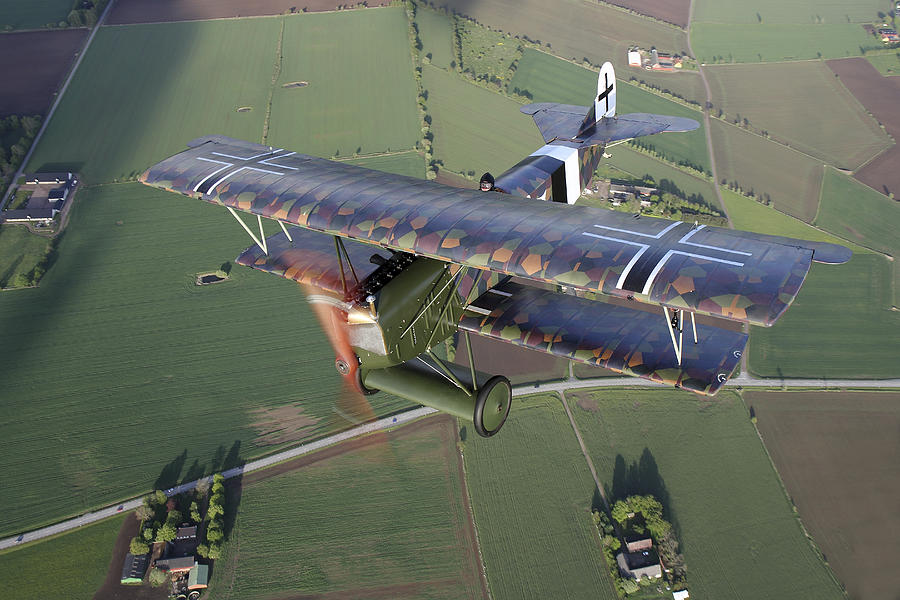 Sebbarp, Sweden - Fokker D.VII World War I replica fighter in the air. #1 Photograph by Daniel Karlsson/Stocktrek Images