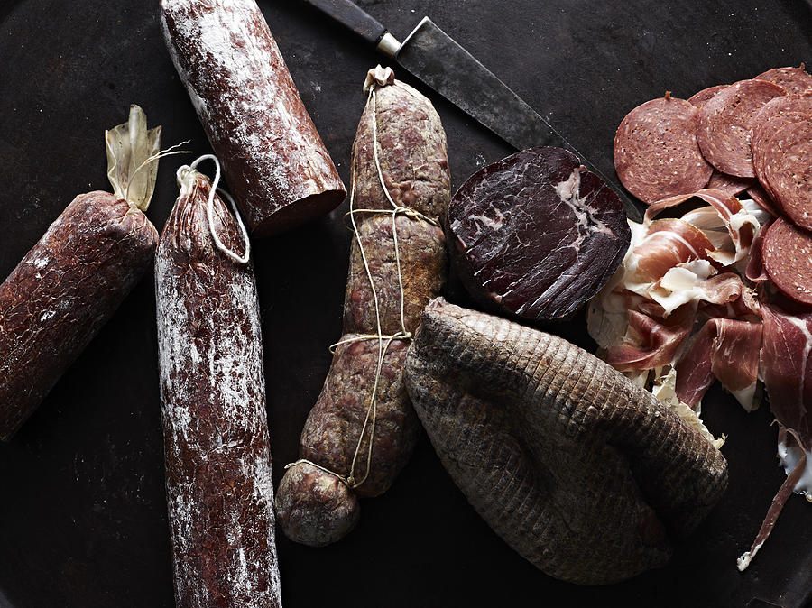 Selection of cured meats, overhead view #1 Photograph by Brett Stevens