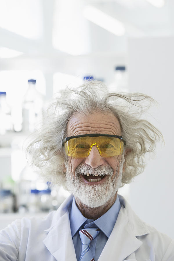 Senior Caucasian scientist with unruly hair in lab #1 Photograph by Klaus Tiedge