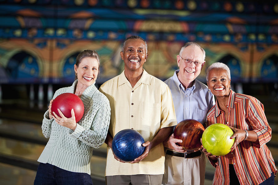 Seniors at bowling alley #1 Photograph by Kali9