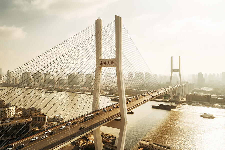 Shanghai Nanpu Bridge over Huangpu River  #1 Photograph by Songquan Deng
