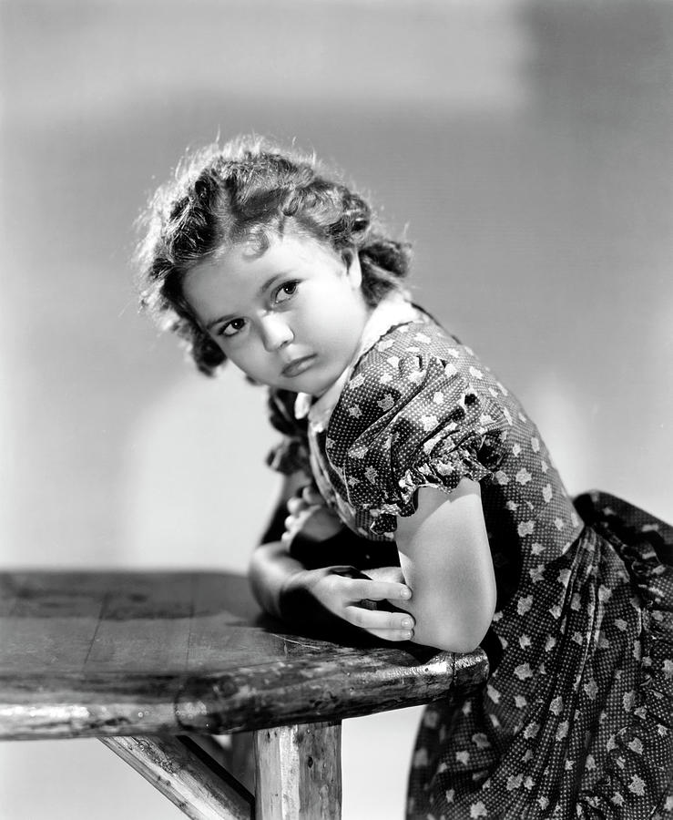Shirley Temple Photograph - SHIRLEY TEMPLE in SUSANNAH OF THE MOUNTIES -1939-, directed by WILLIAM A. SEITER. #1 by Album