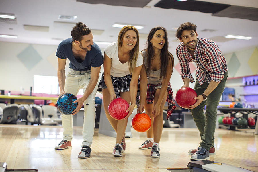 Smiling Friends Bowling Together #1 Photograph by Vgajic