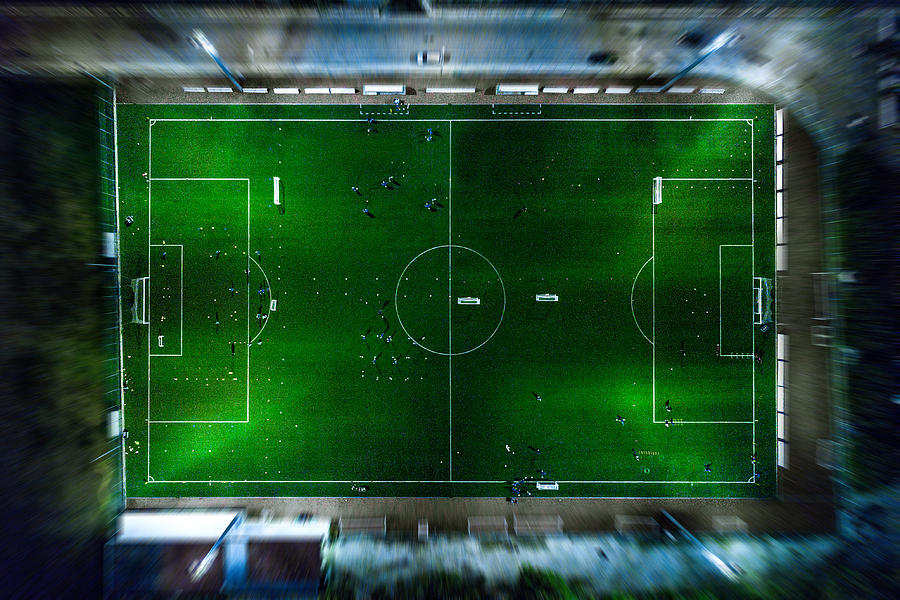 Soccer field at night - aerial view #1 Photograph by LeoPatrizi