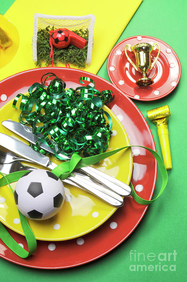 Soccer football celebration party table settings in red, green a #1 Photograph by Milleflore Images