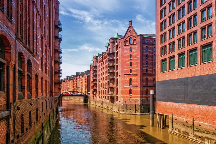 Speicherstadt Warehouses along the Canal, Hamburg, Germany #1 Photograph by Elenarts - Elena Duvernay photo
