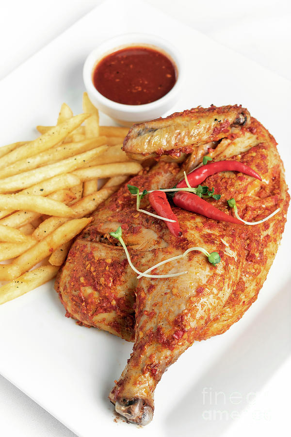 Spicy Portuguese Piri Piri Half Chicken With Fries On Plate Photograph