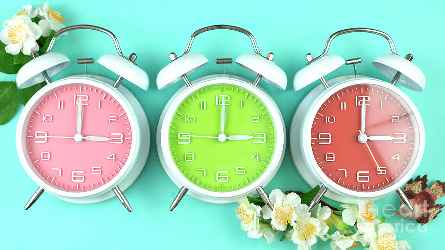 Springtime Daylight Saving Time Clocks #1 Photograph by Milleflore Images