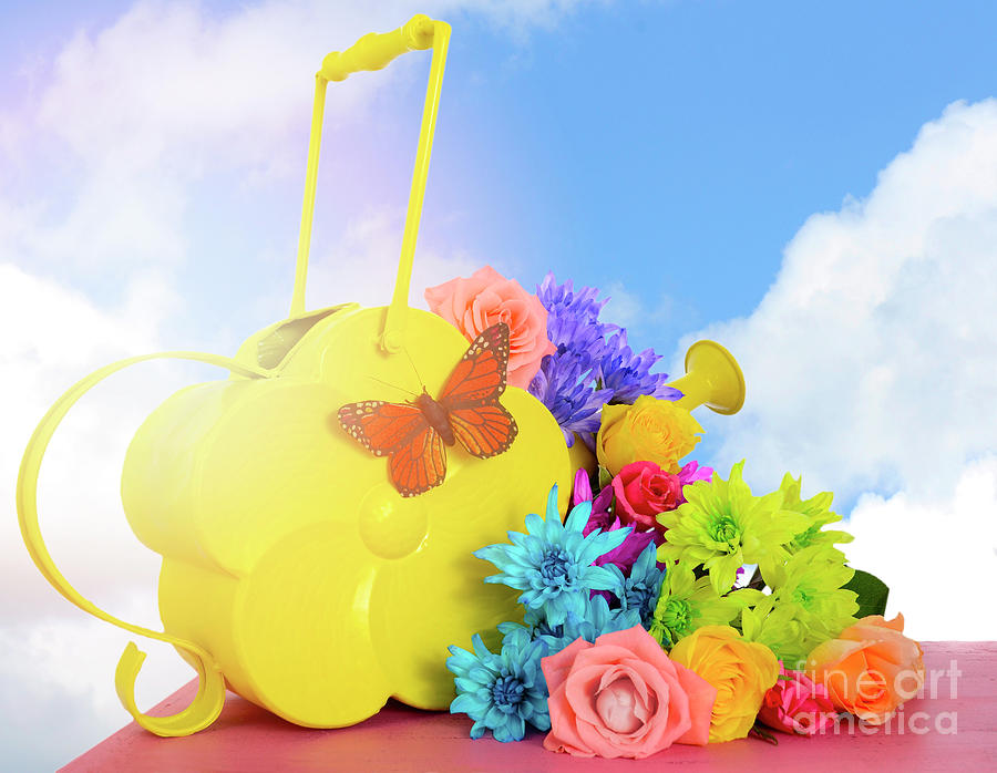 Springtime watering can and colorful bouquet flowers. #1 Photograph by Milleflore Images
