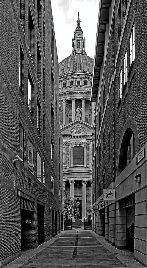 Monochrome Narrow view of St Pauls Cathedral London Photograph by John Gilham