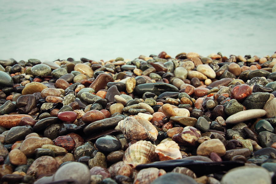 Stones background on the beach Photograph by George Mdivanian - Fine