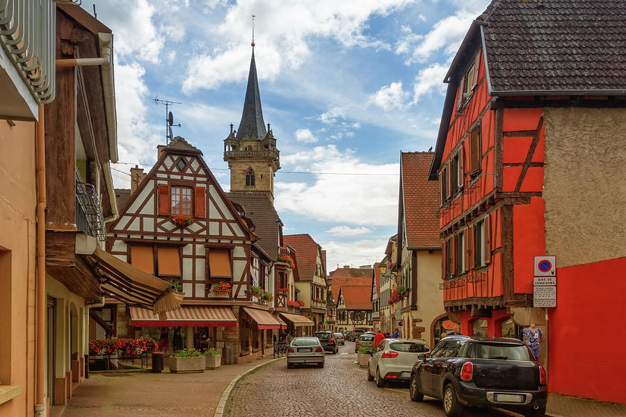 Street, houses and church towers in Obernai, Alsace, France #1 Photograph by Elenarts - Elena Duvernay photo