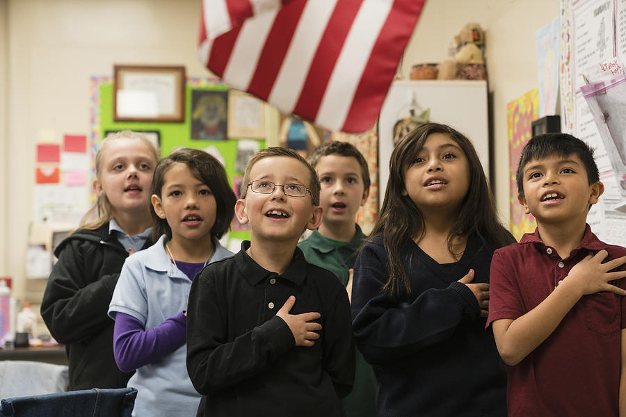 Students standing for Pledge of Allegiance #1 Photograph by Hill Street Studios