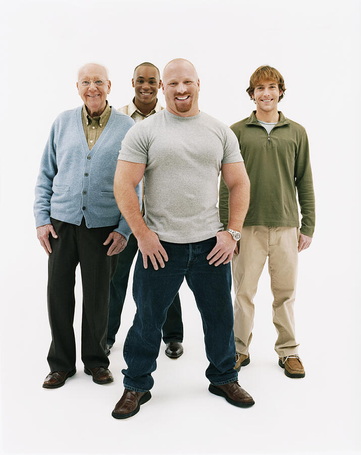 Studio Portrait of Four Smiling Men of Mixed Ages #1 Photograph by Digital Vision.