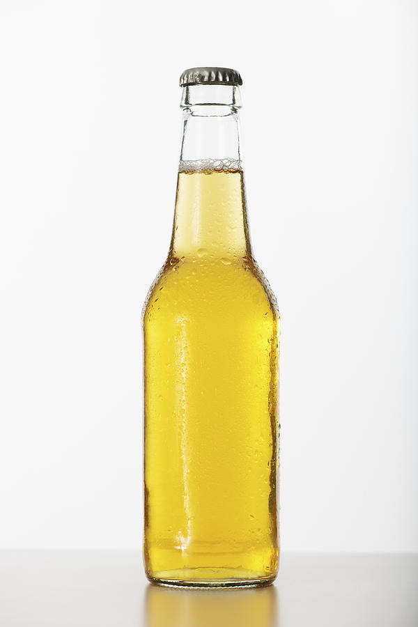 Studio shot of beer bottle #1 Photograph by Tetra Images
