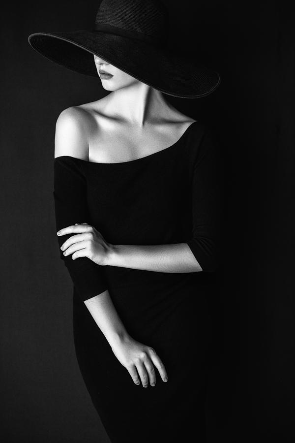 Studio shot of young beautiful woman wearing hat #1 Photograph by CoffeeAndMilk