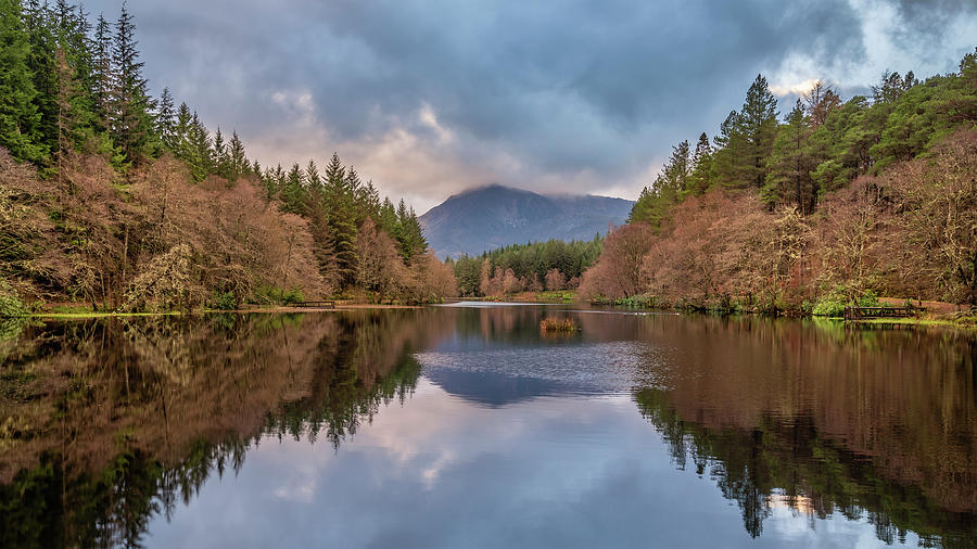 Stunning landscape image of Glencoe Lochan with Pap of Glencoe i ...