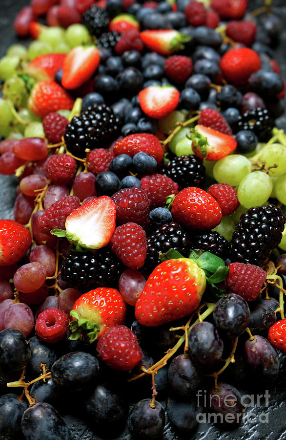 Summer berries food background full frame close up. #1 Photograph by Milleflore Images