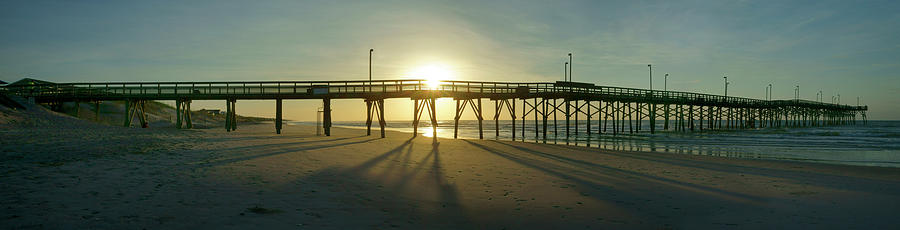 Sunrise at the Jolly Roger Pier Photograph by Mike McGlothlen