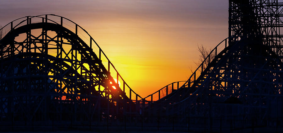 Sunrise Photograph - Sunrise through the rails of the Zippin Pippin Roller Coaster #1 by James Brey