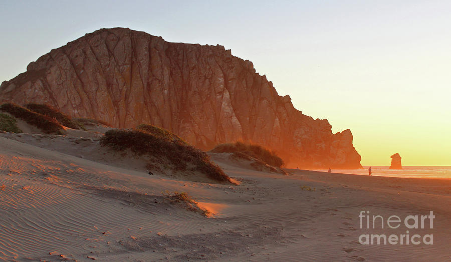 Sun setting at Morro Rock Beach Photograph by Michael Rock