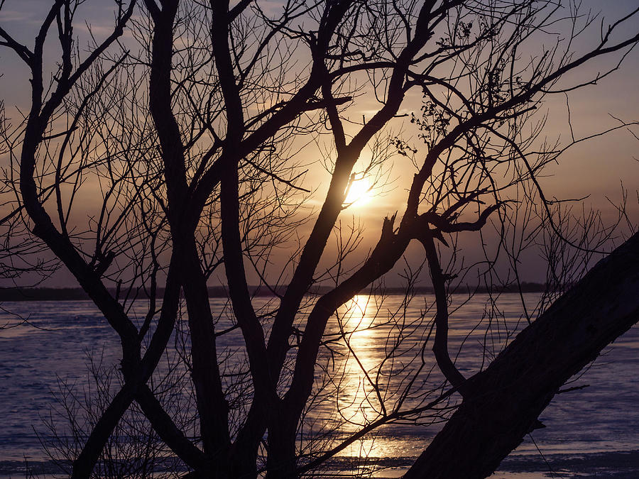 Sunset on the frozen Ottawa River. #1 Photograph by Rob Huntley