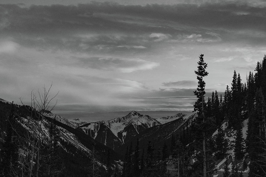 Sunset over the Rocky Mountains along the Million Dollar Highway in Colorado in black and white #1 Photograph by Eldon McGraw