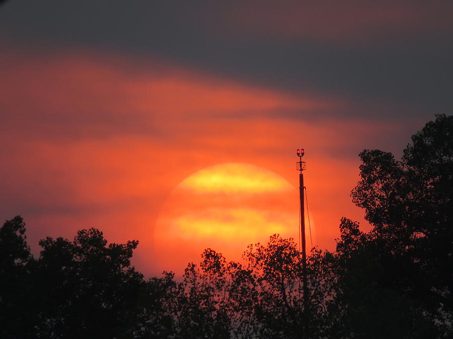 Sunset through smoke Photograph by Pat Wolesky - Fine Art America