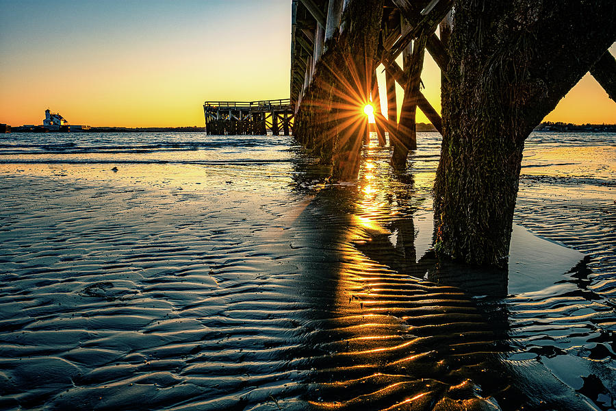 Sunset Under The Pier #1 Photograph by Jeff Sinon