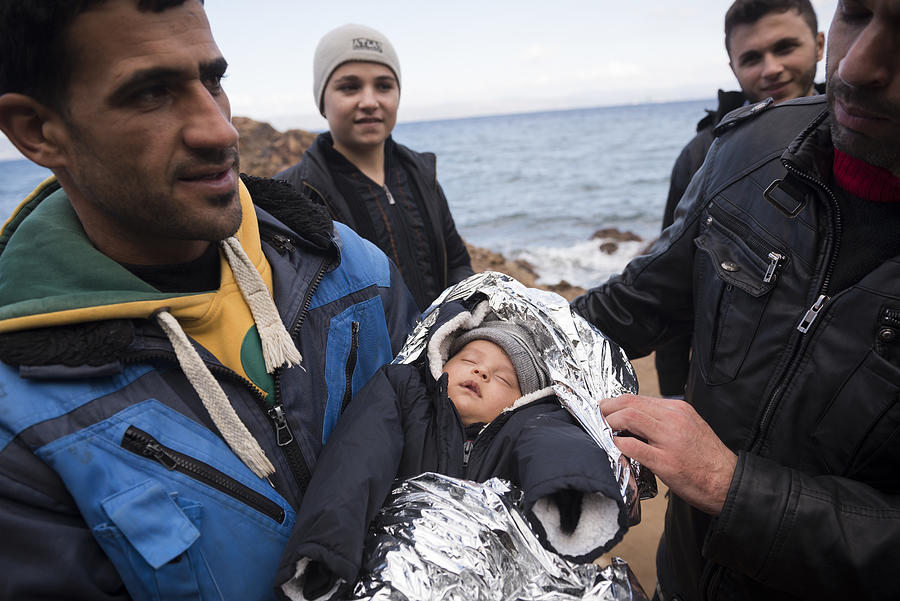 Syrian refugees on the island of Lesbos, Greece #1 Photograph by Joel Carillet