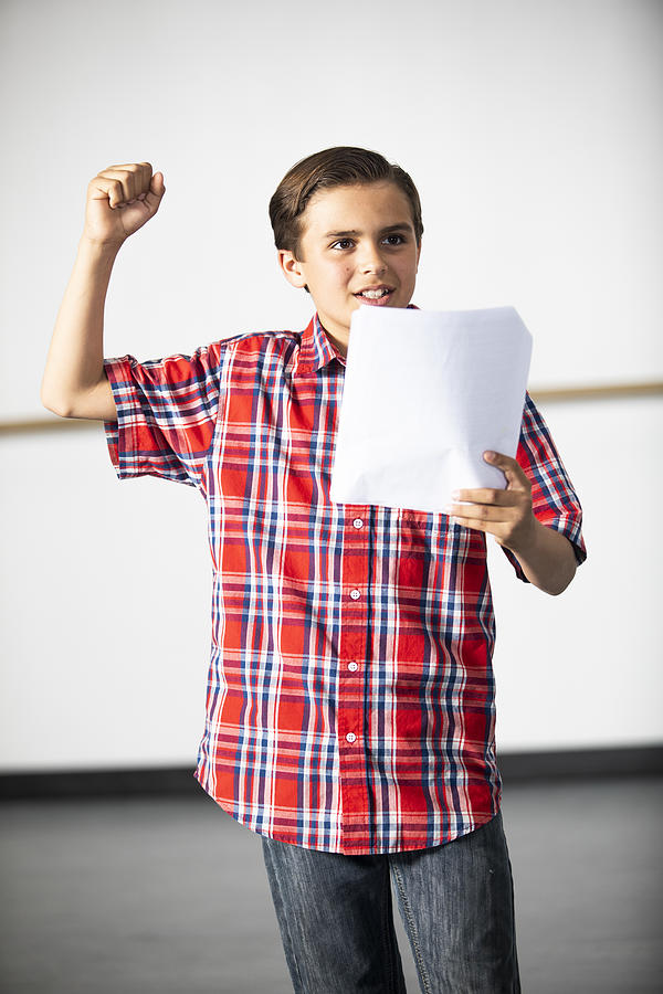 Teenage Boy Actor Practicing Theatre #1 Photograph by Adamkaz