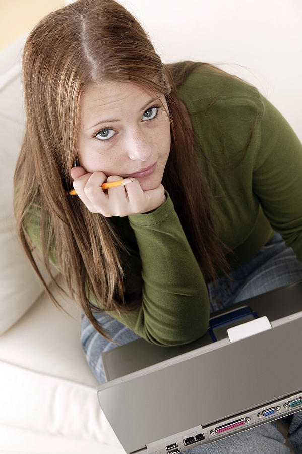 Teenager with laptop #1 Photograph by Comstock Images