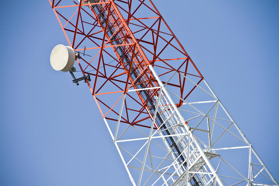 Telecommunications tower. Mobile phone base station #1 Photograph by Jukree