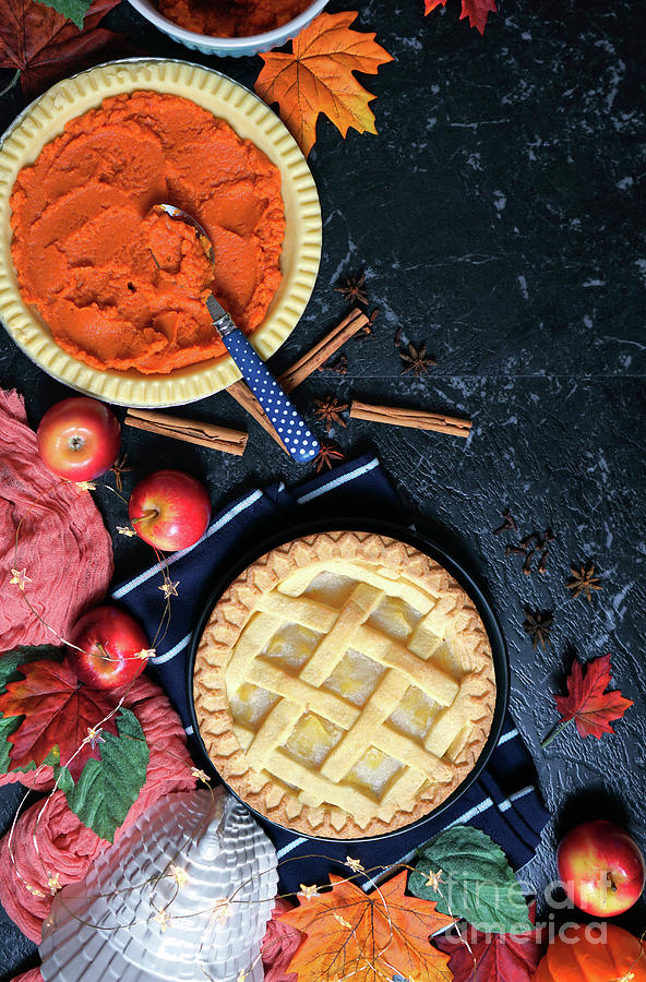 Thanksgiving Photograph - Thanksgiving apple and pumpkin pies on dark marble background. #1 by Milleflore Images