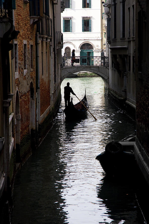 The gondola and the gondolier #1 Photograph by Riccardo Forte