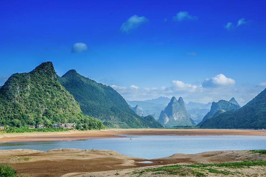 The mountain and river scenery with blue sky, Guilin, China. #1 Photograph by Carl Ning