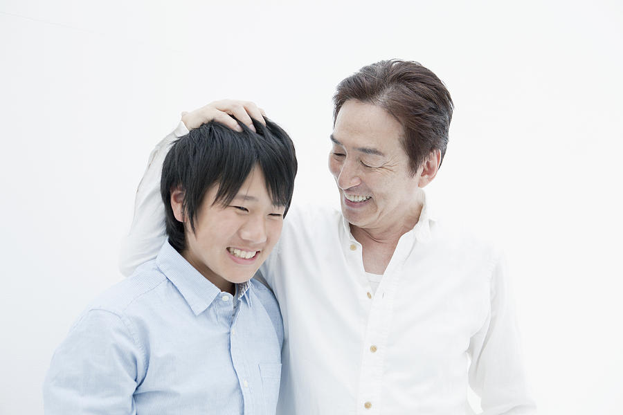 The smiling face of father and son #1 Photograph by Indeed