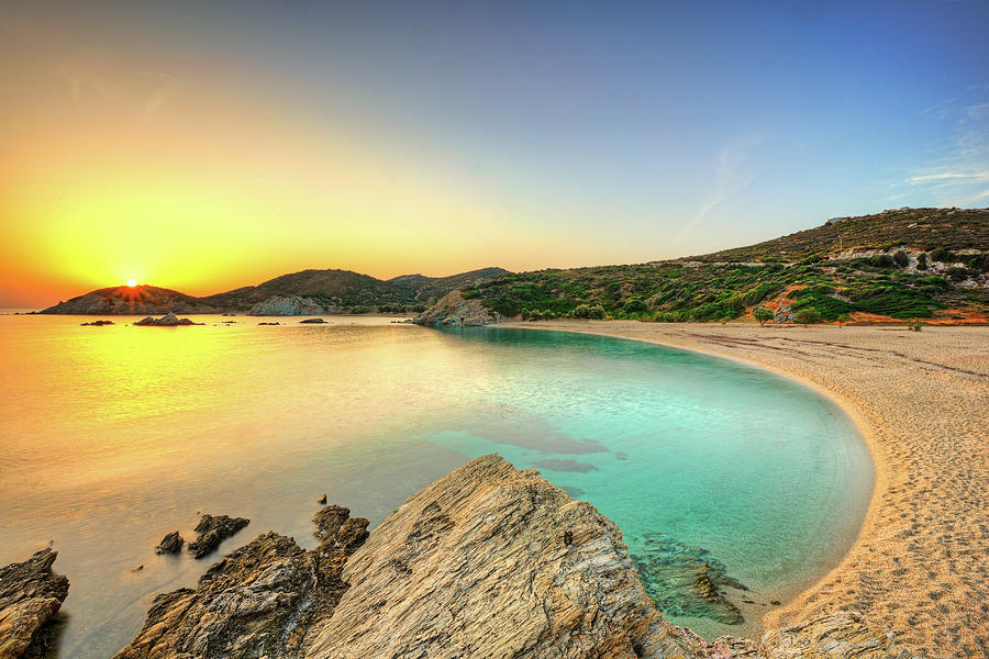 The sunrise at Cheromylos beach in Evia, Greece #1 Photograph by Constantinos Iliopoulos