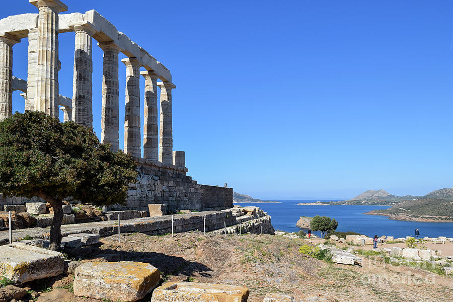 The Temple of Poseidon sits on a hilltop on Cape Sounion, Attica #1 Photograph by William Kuta